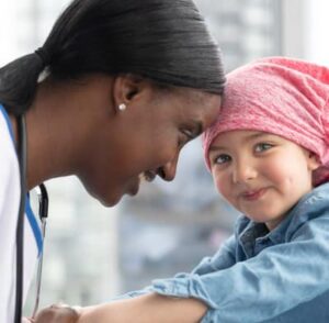 Doctor smiling at a young child